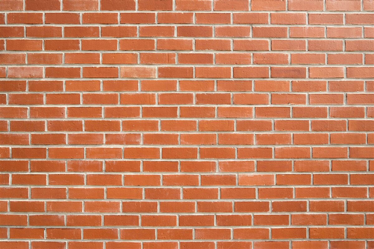 Fototapeta Stena z červených tehál, položená hladko