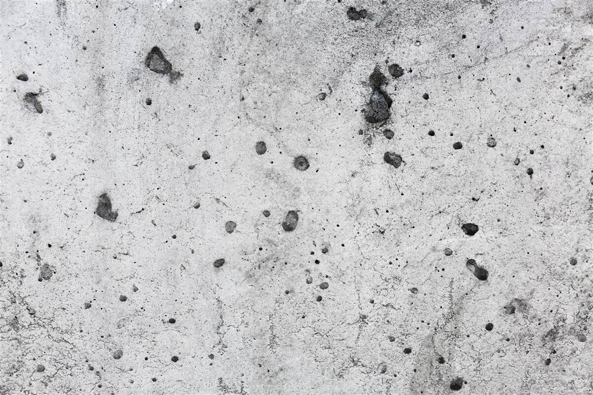 Fototapeta betónová stena s tmavými stopami