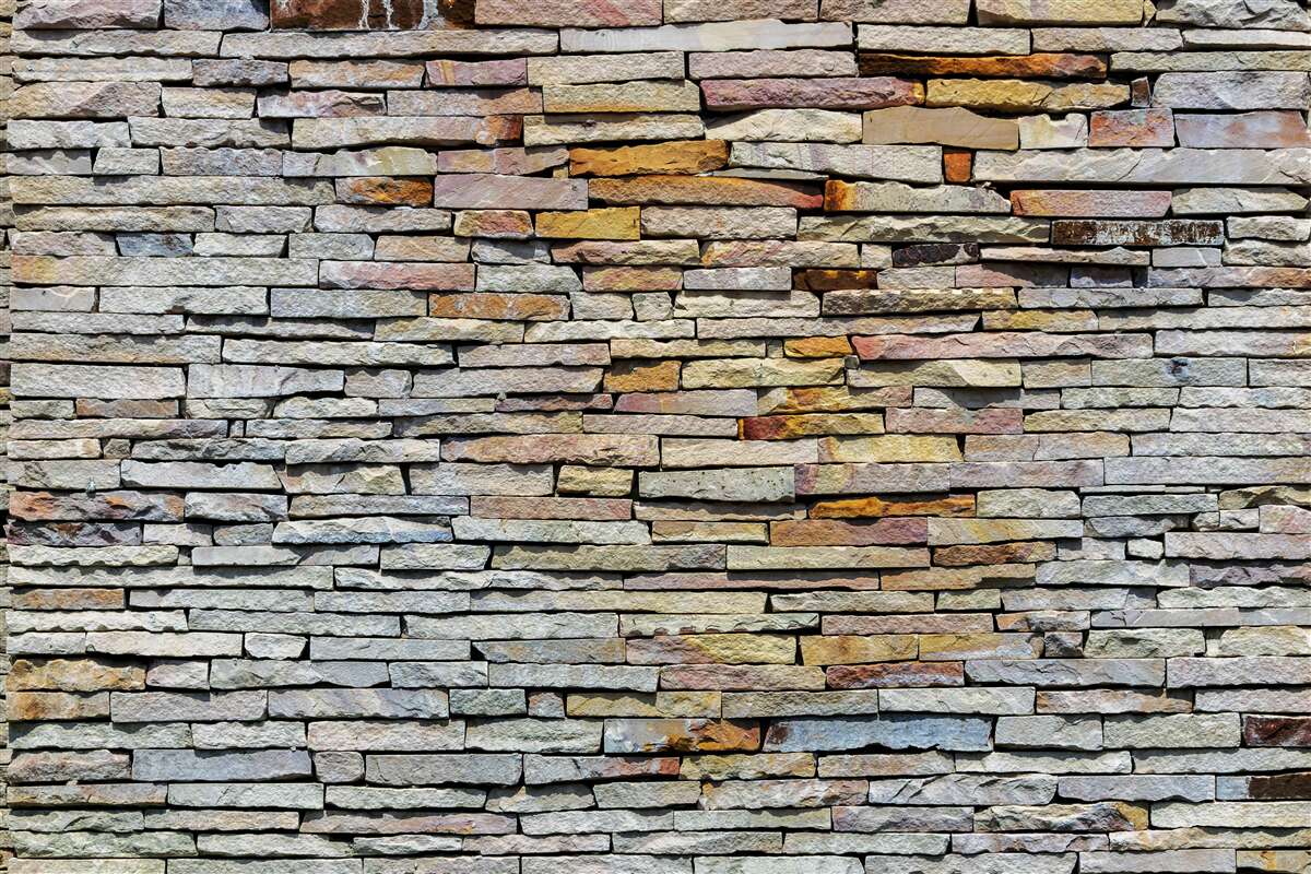 Fototapeta Stena je pokrytá kamennými pruhmi