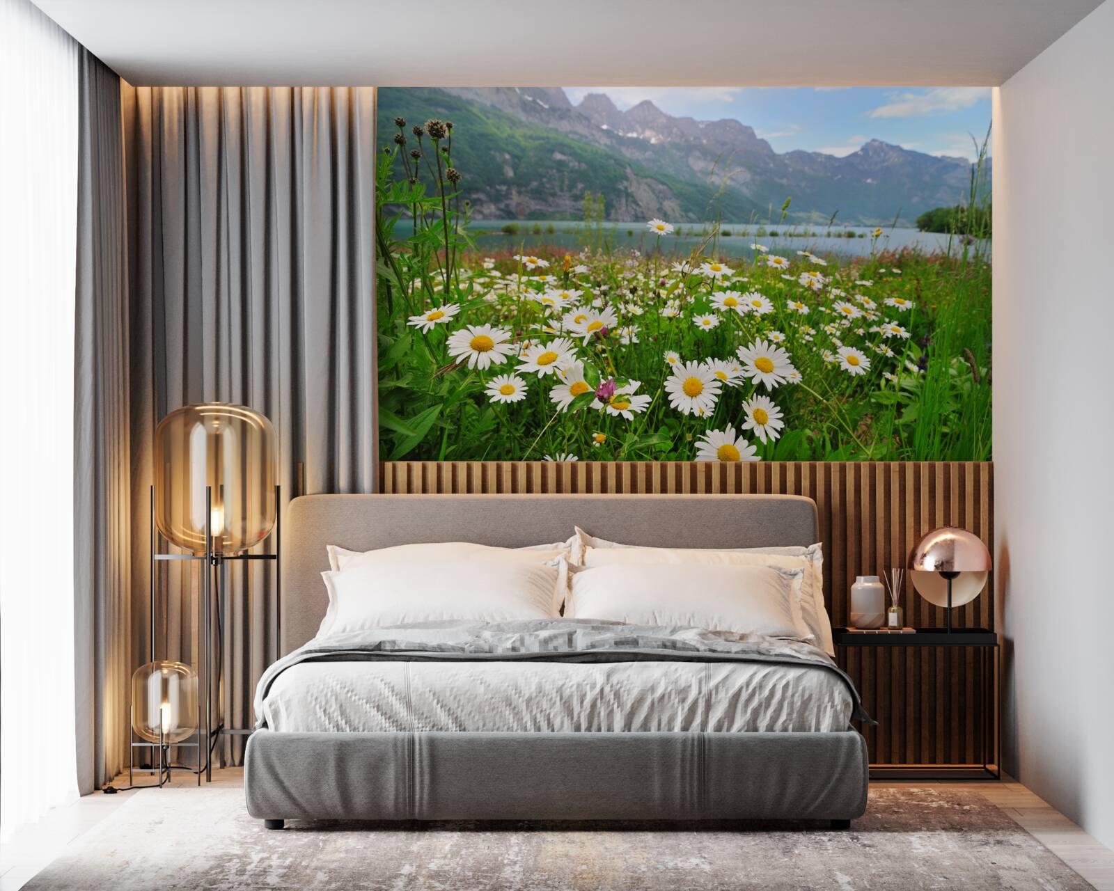 Fototapeta krajina s rumančekovým poľom na úpätí hôr