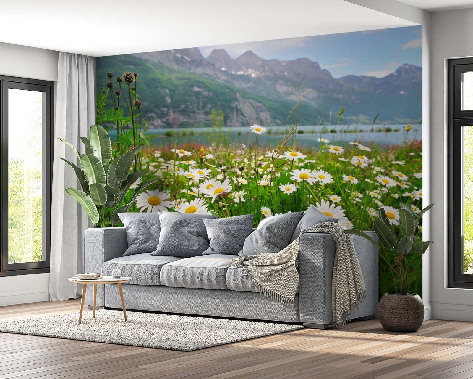 Fototapeta krajina s rumančekovým poľom na úpätí hôr