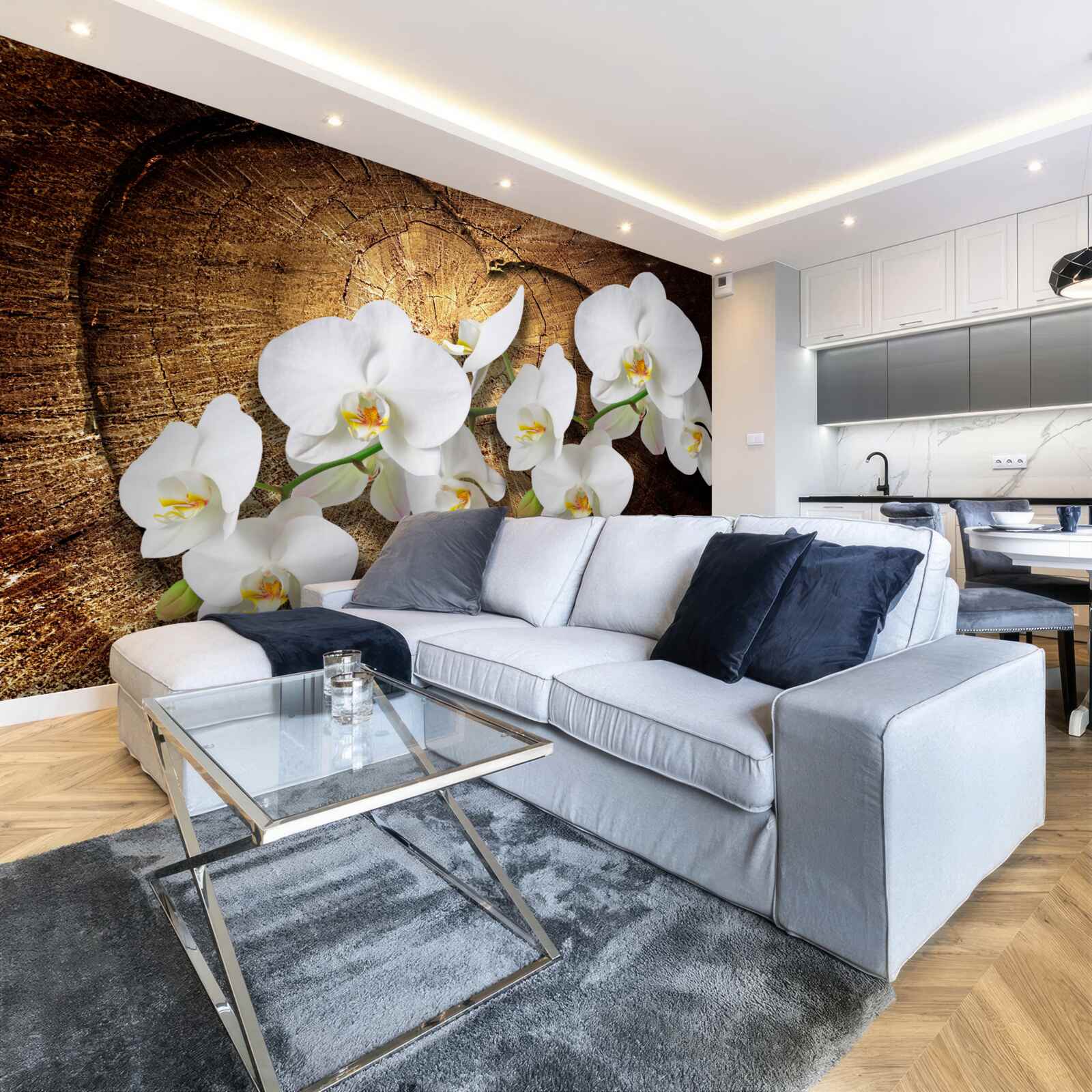 Fototapeta Snehobiela orchidea na rezanom kmeni stromu