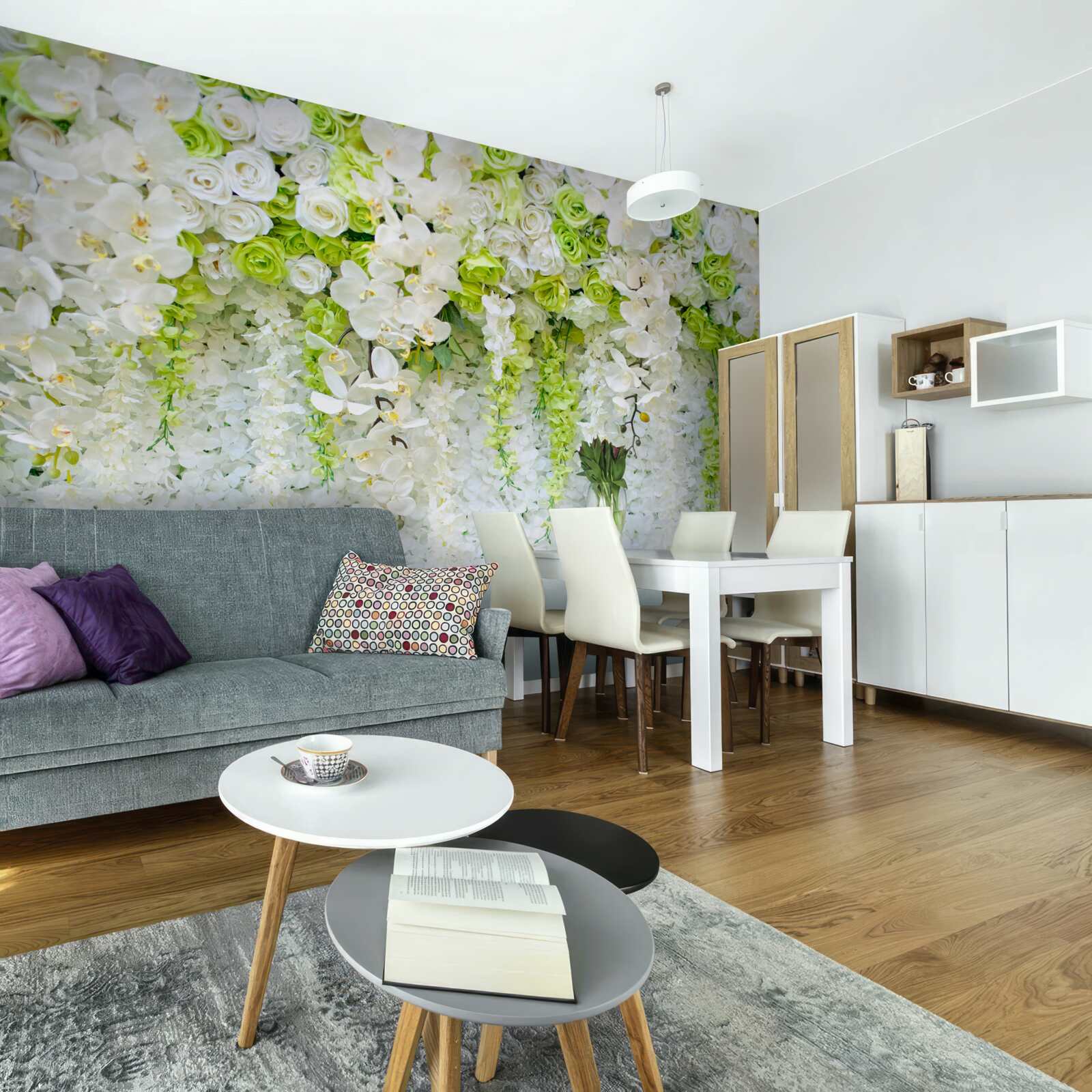 Fototapeta biele orchidey pokryli stenu kvetinovým kobercom