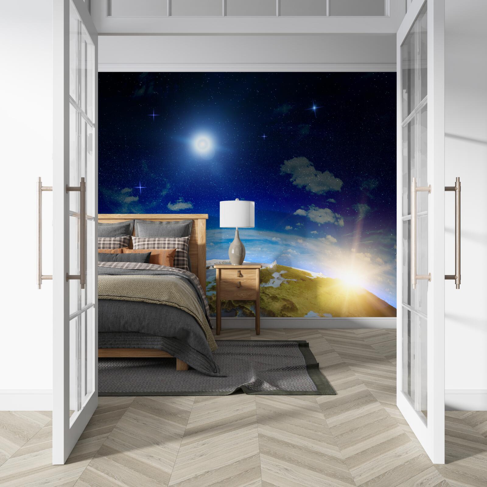 Fototapeta slnko vychádzajúce nad planétou