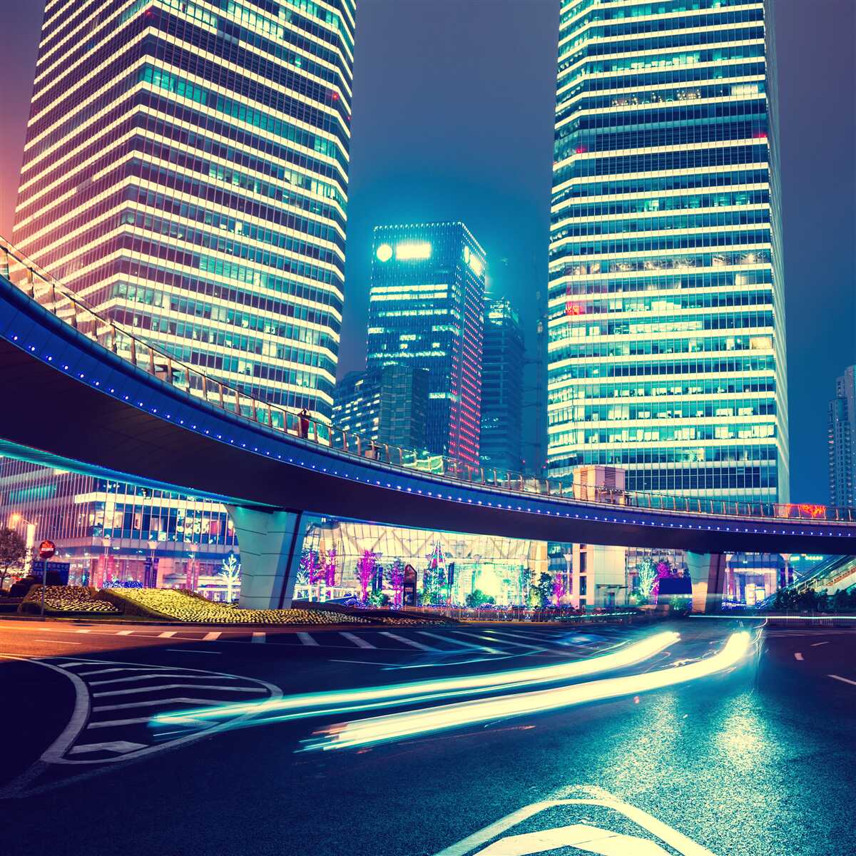 Fototapeta nočné mesto s mrakodrapmi a mostom