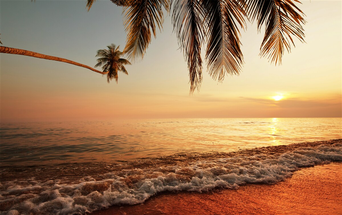 Fototapeta tropický ostrov pri západe slnka