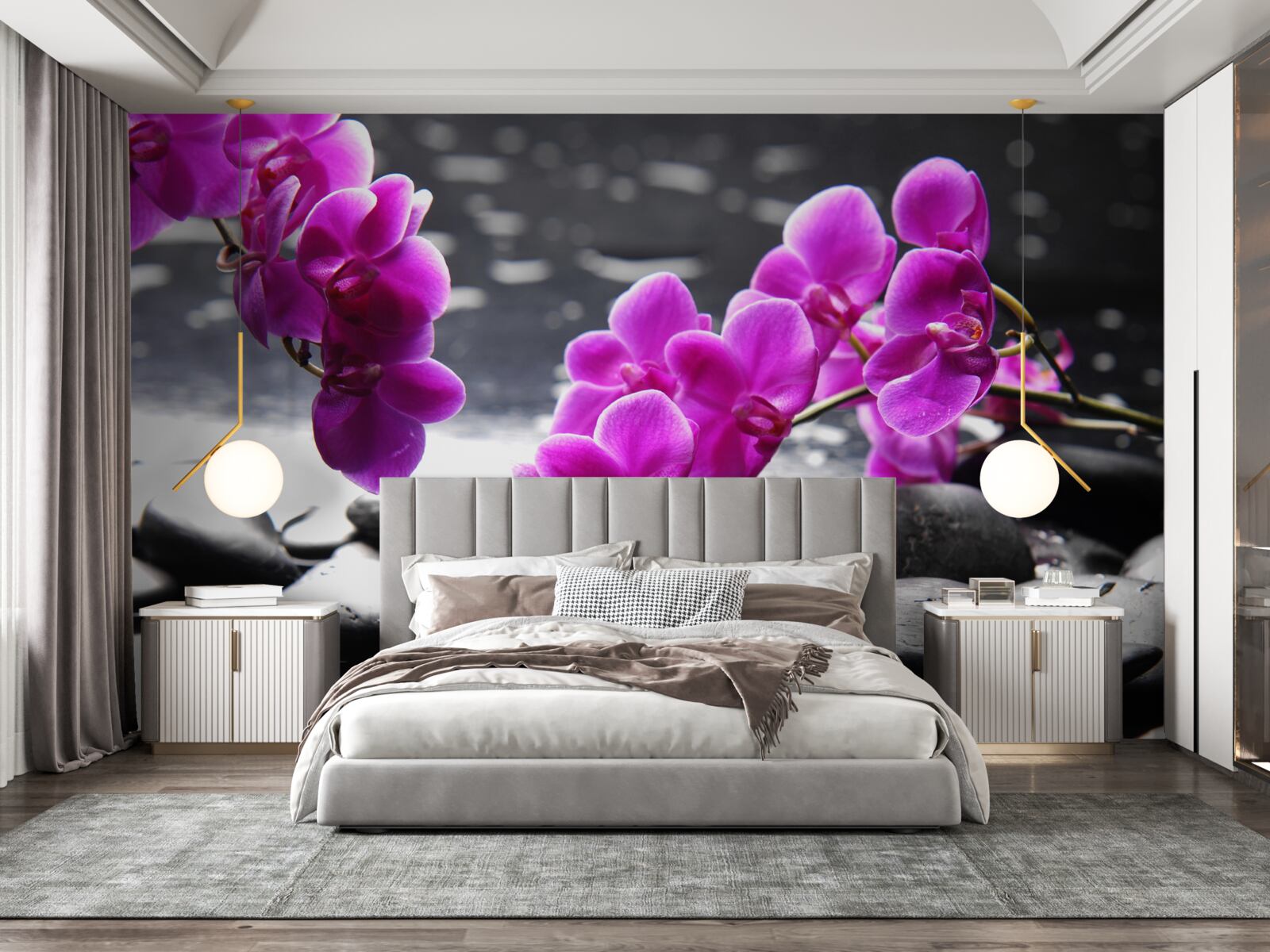 Fototapeta orchidea s lila odtieňom, osadená na matných čiernych kameňoch