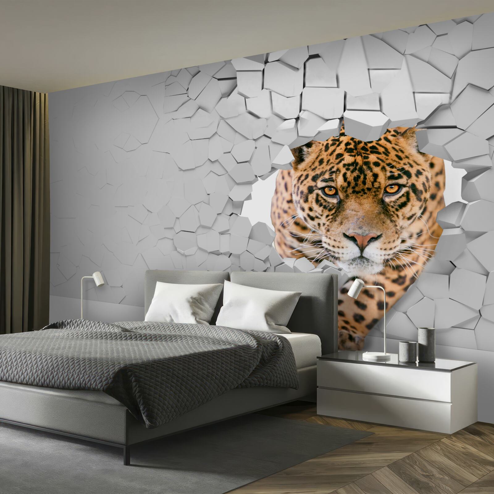 Fototapeta leopard prerazí kamennú bariéru