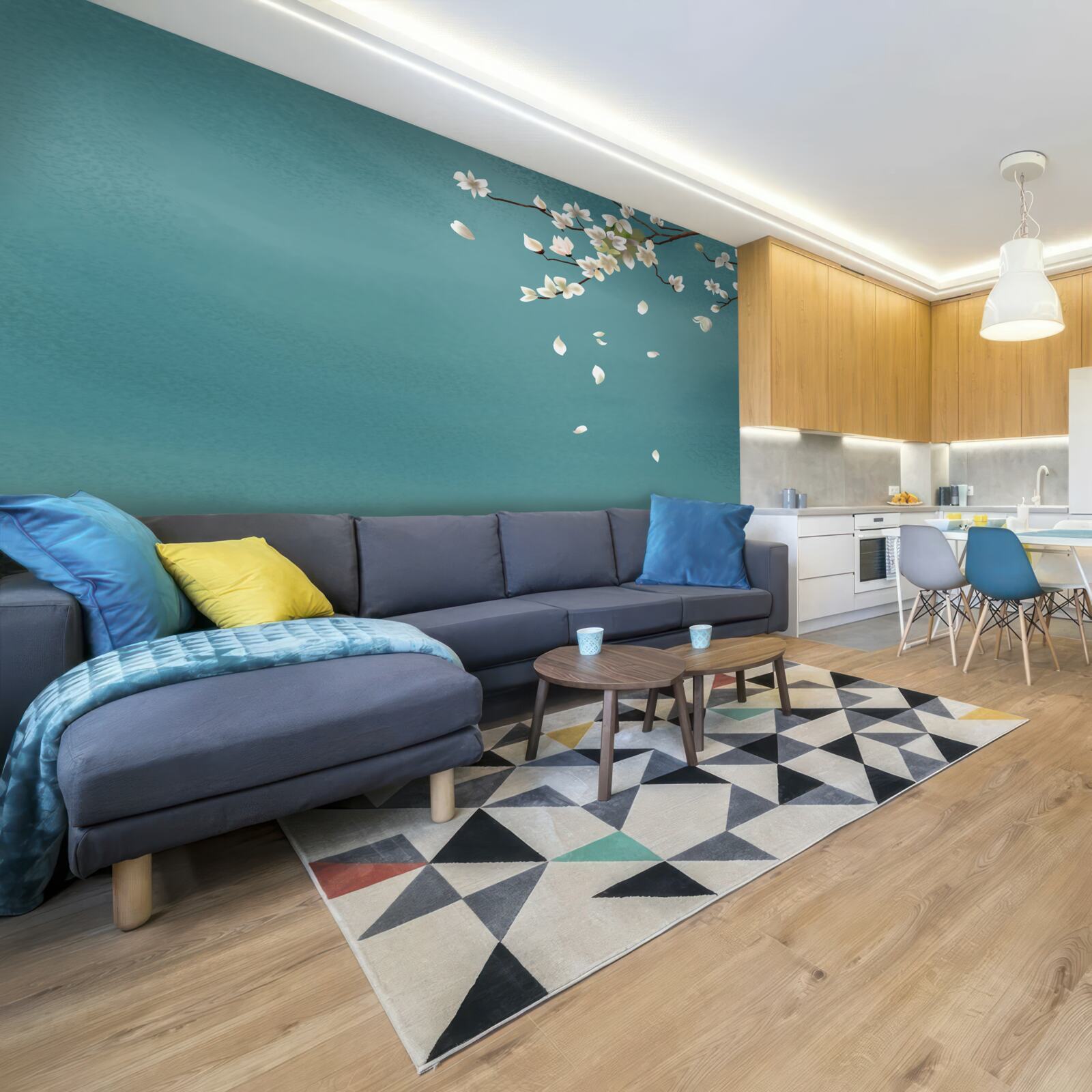 Fototapeta tyrkysový podklad zdobí rozkvitnutý stromček