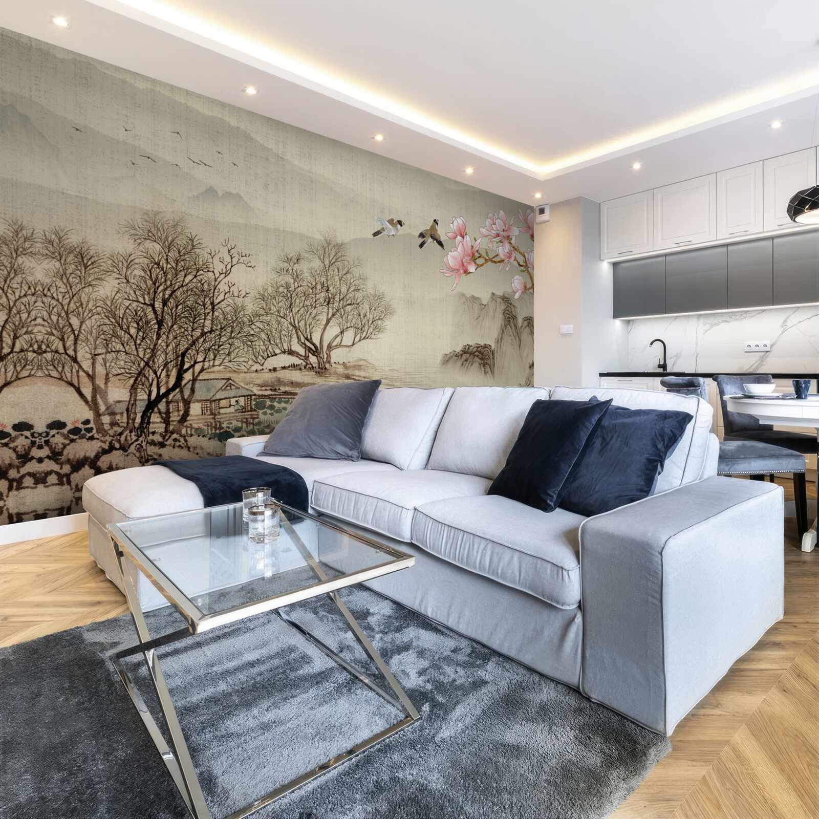 Fototapeta rozkvitnutá magnólia a pokojná rieka v horách