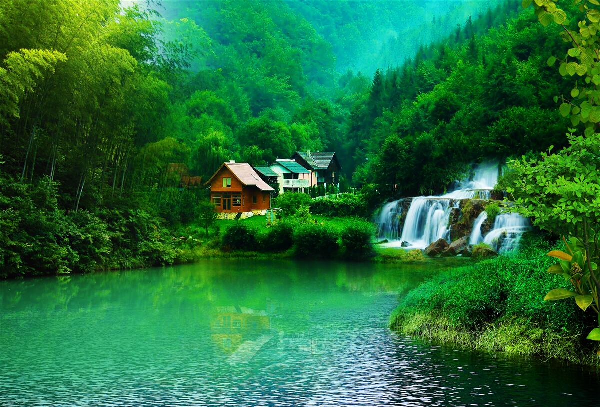 Fototapeta pokojný vodopád vedľa domu pri jazere