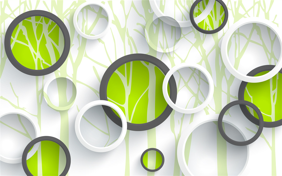 Fototapeta kruhy zelenej farby prepletené na zalesnenom pozadí