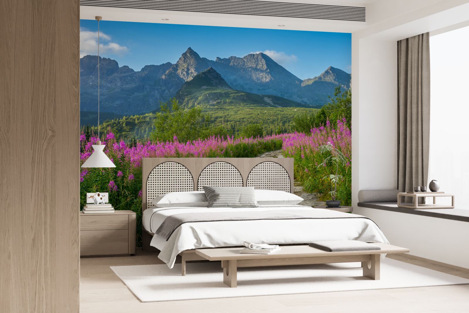 Fototapeta Cesta uprostred rozkvitnutého poľa v horskej oblasti