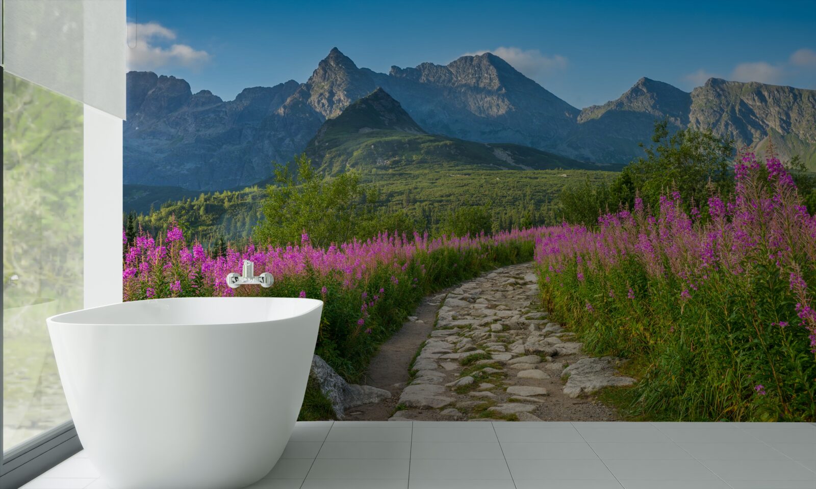 Fototapeta Cesta uprostred rozkvitnutého poľa v horskej oblasti