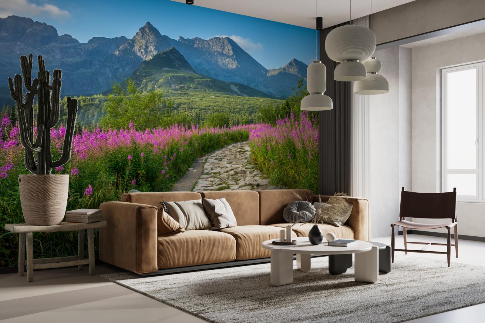 Fototapeta Cesta uprostred rozkvitnutého poľa v horskej oblasti