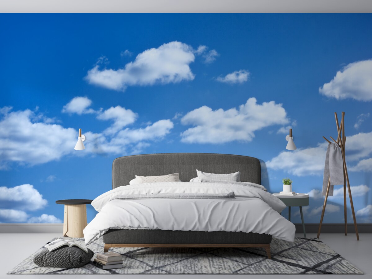 Fototapeta biele oblaky plávajúce na modrej oblohe