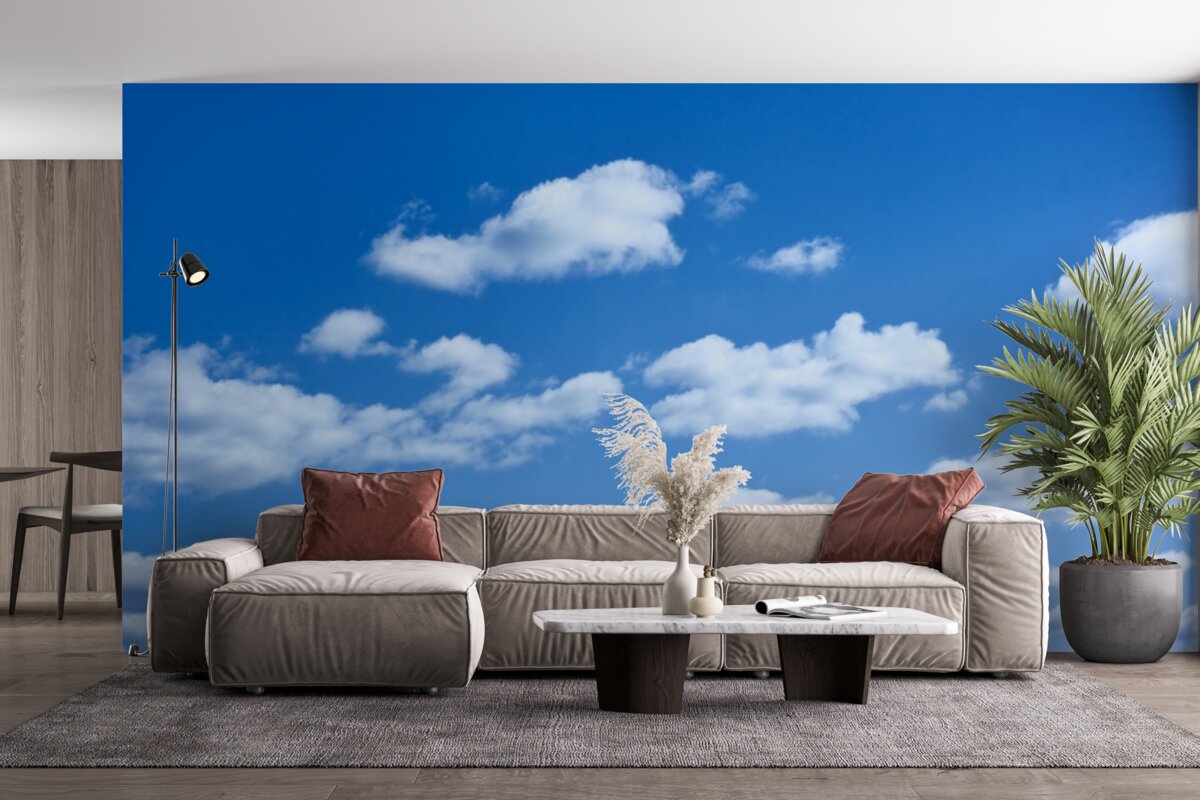 Fototapeta biele oblaky plávajúce na modrej oblohe