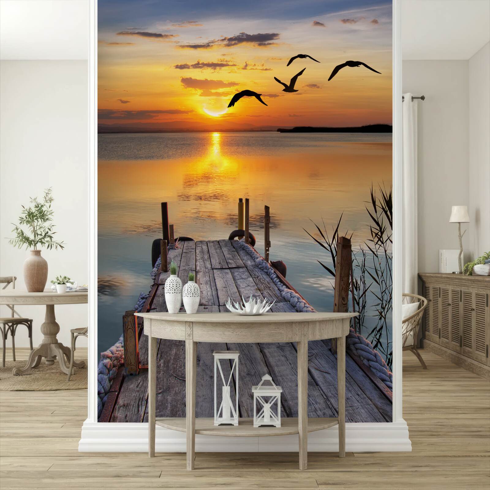 Fototapeta teplý západ slnka na moste, kde krúžia čajky