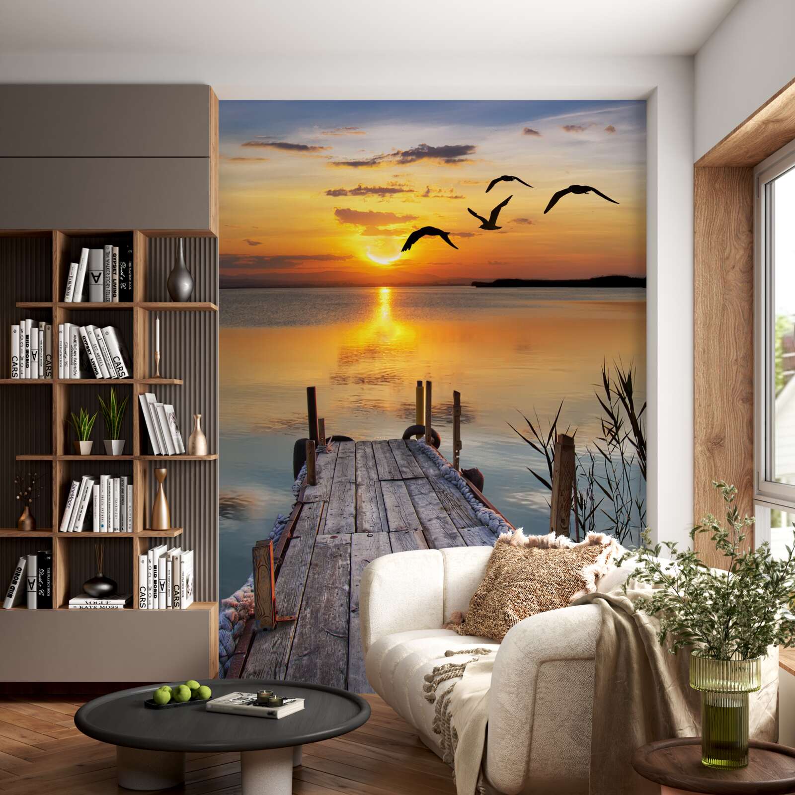 Fototapeta teplý západ slnka na moste, kde krúžia čajky