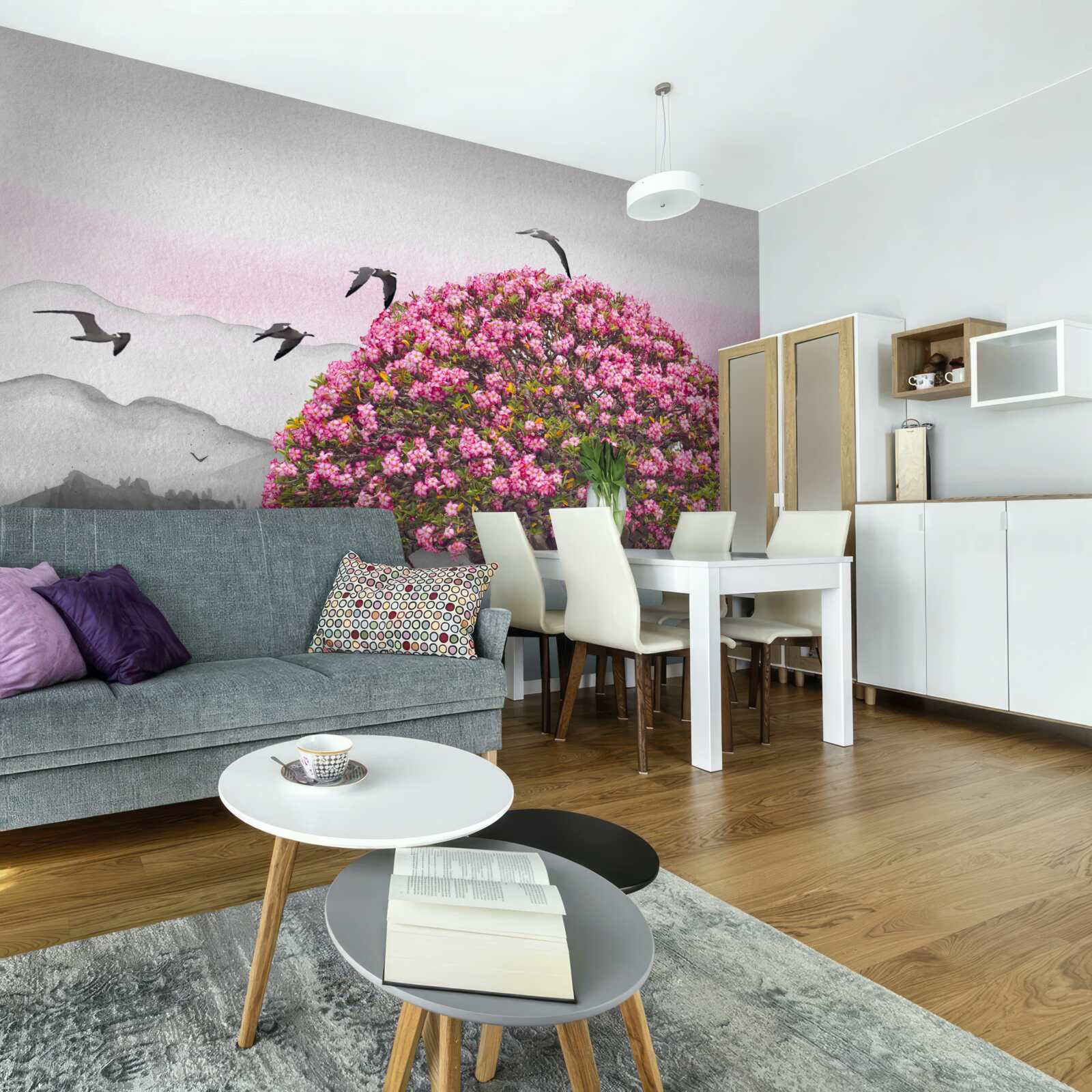 Fototapeta vtáky lietajú nad kvitnúcim stromom