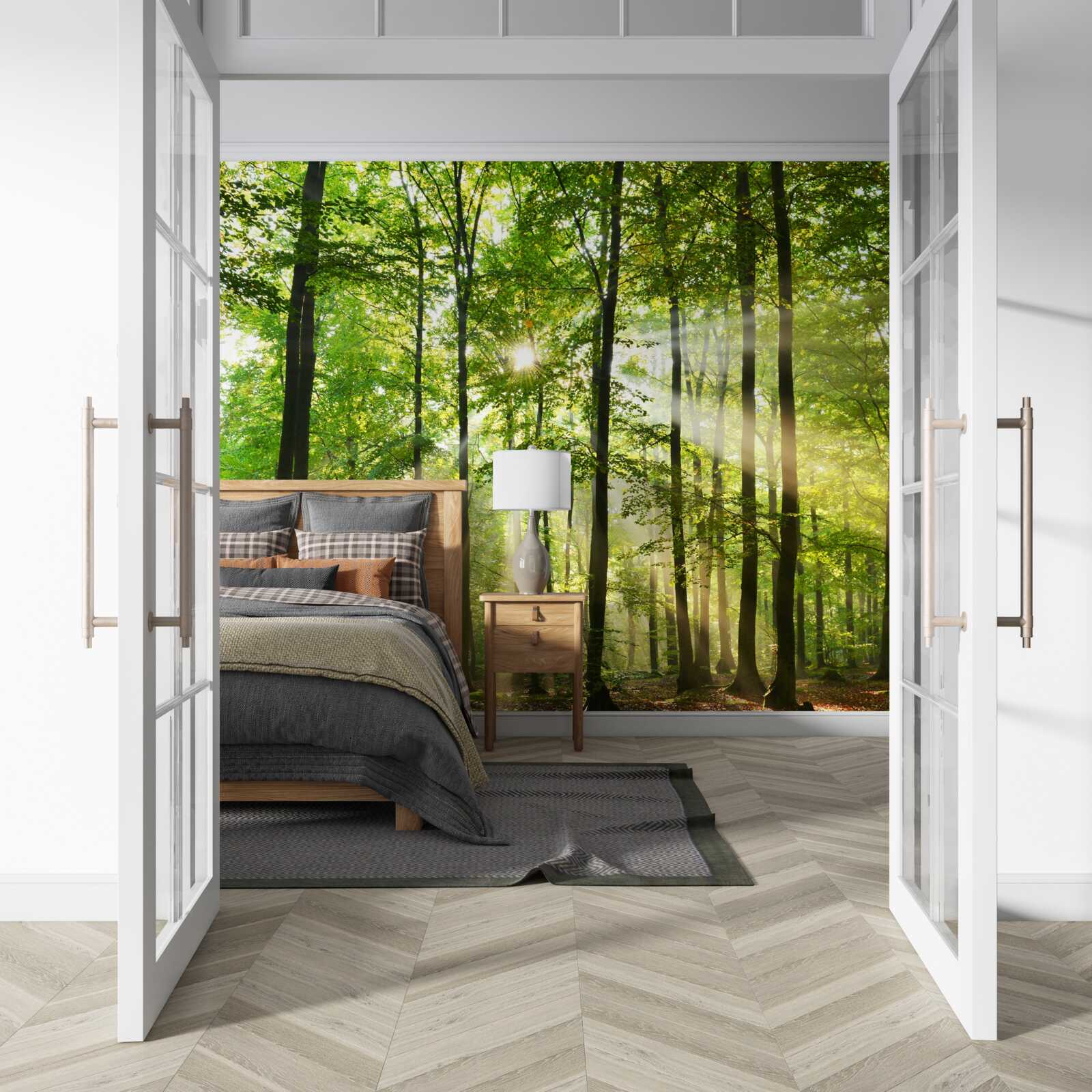 Fototapeta slnečné lúče prenikajú cez usporiadaný zelený les