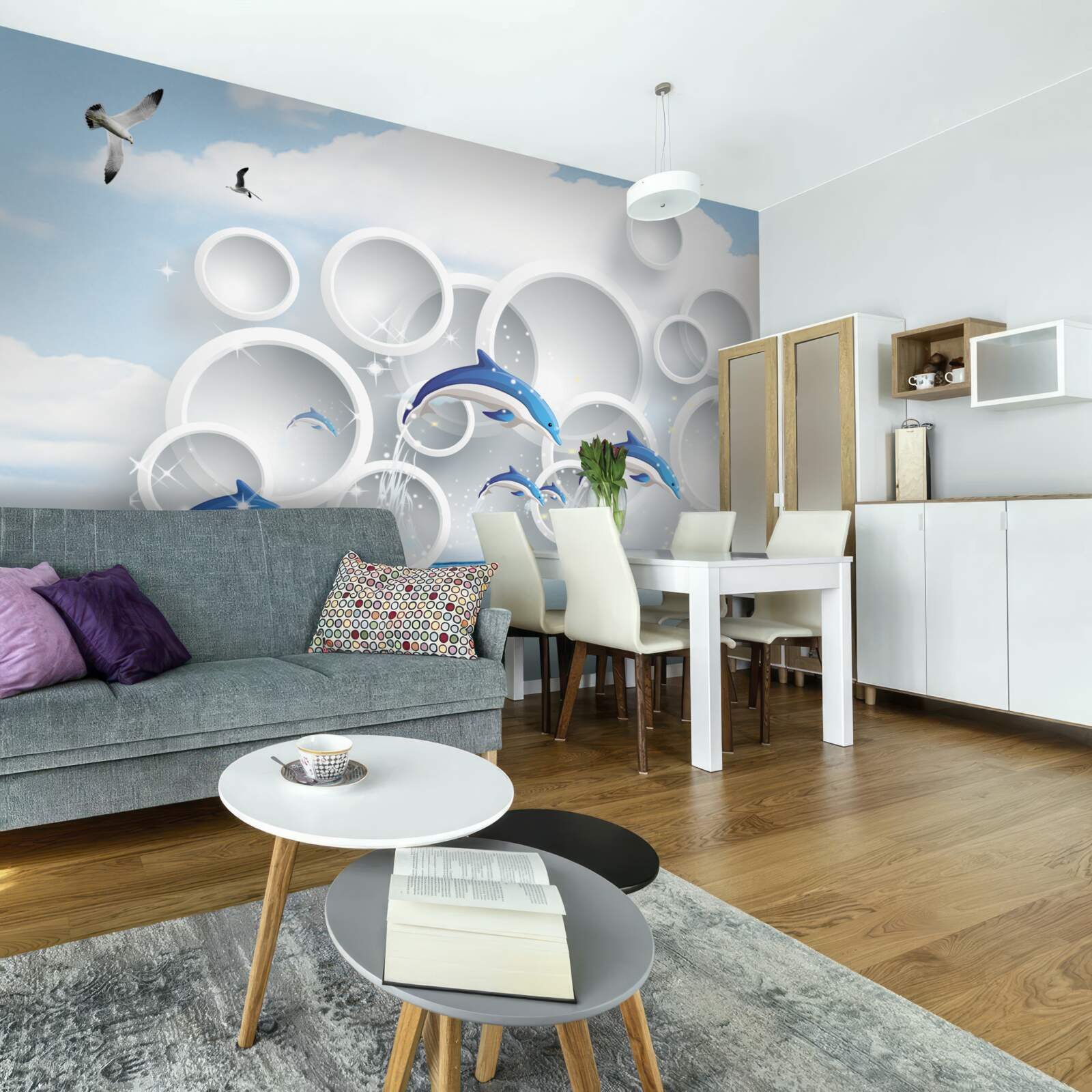 Fototapeta abstraktné prstene a delfíny skákajúce po vodnej hladine