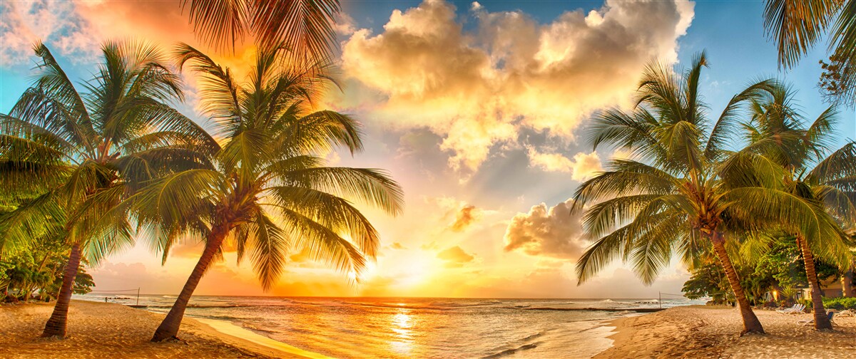 Fototapeta slnko zapadá nad oceánom