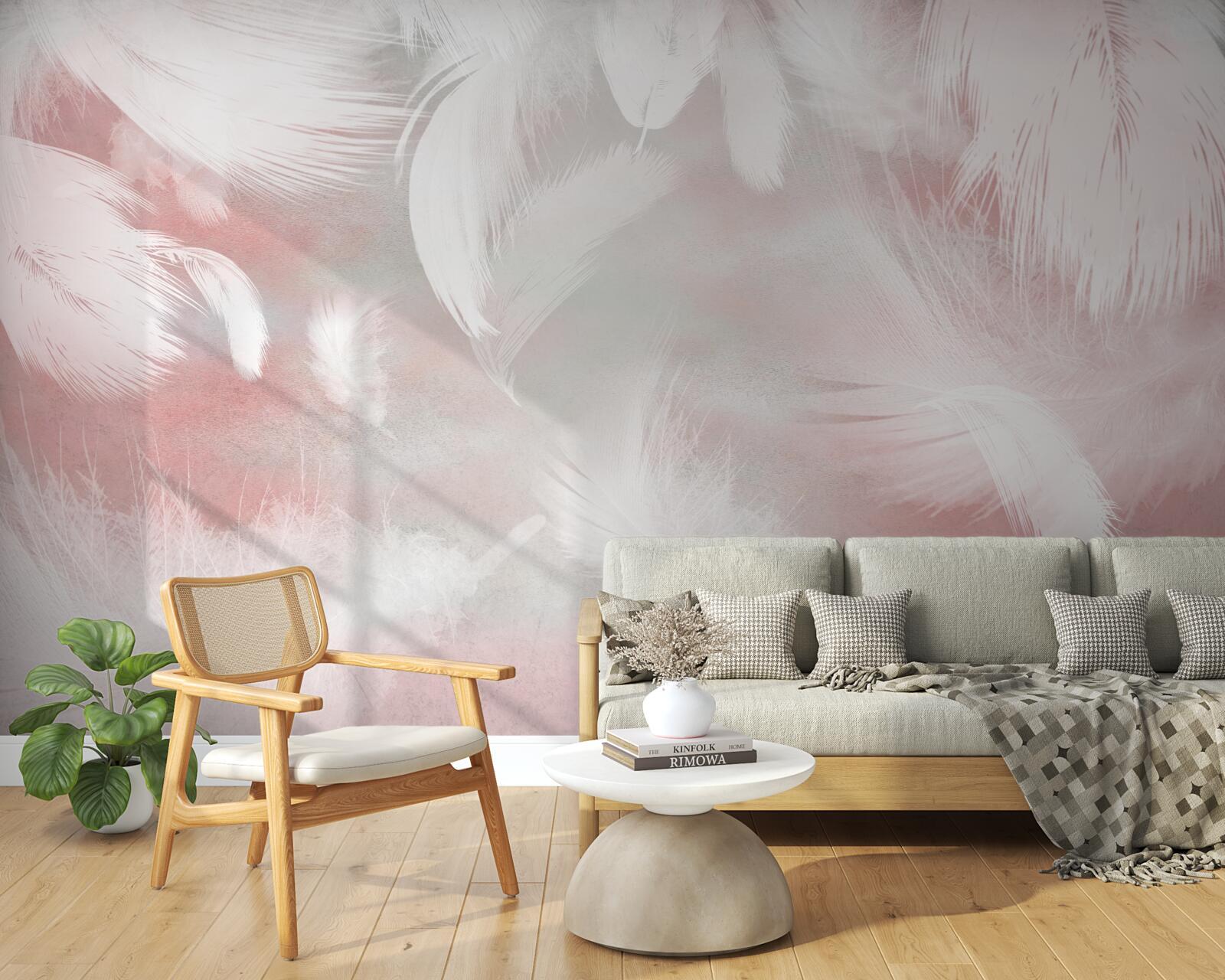 Fototapeta ružový podklad je zdobený bielymi pierkami