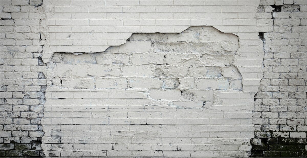 Fototapeta sivý kameň a tehlová stena