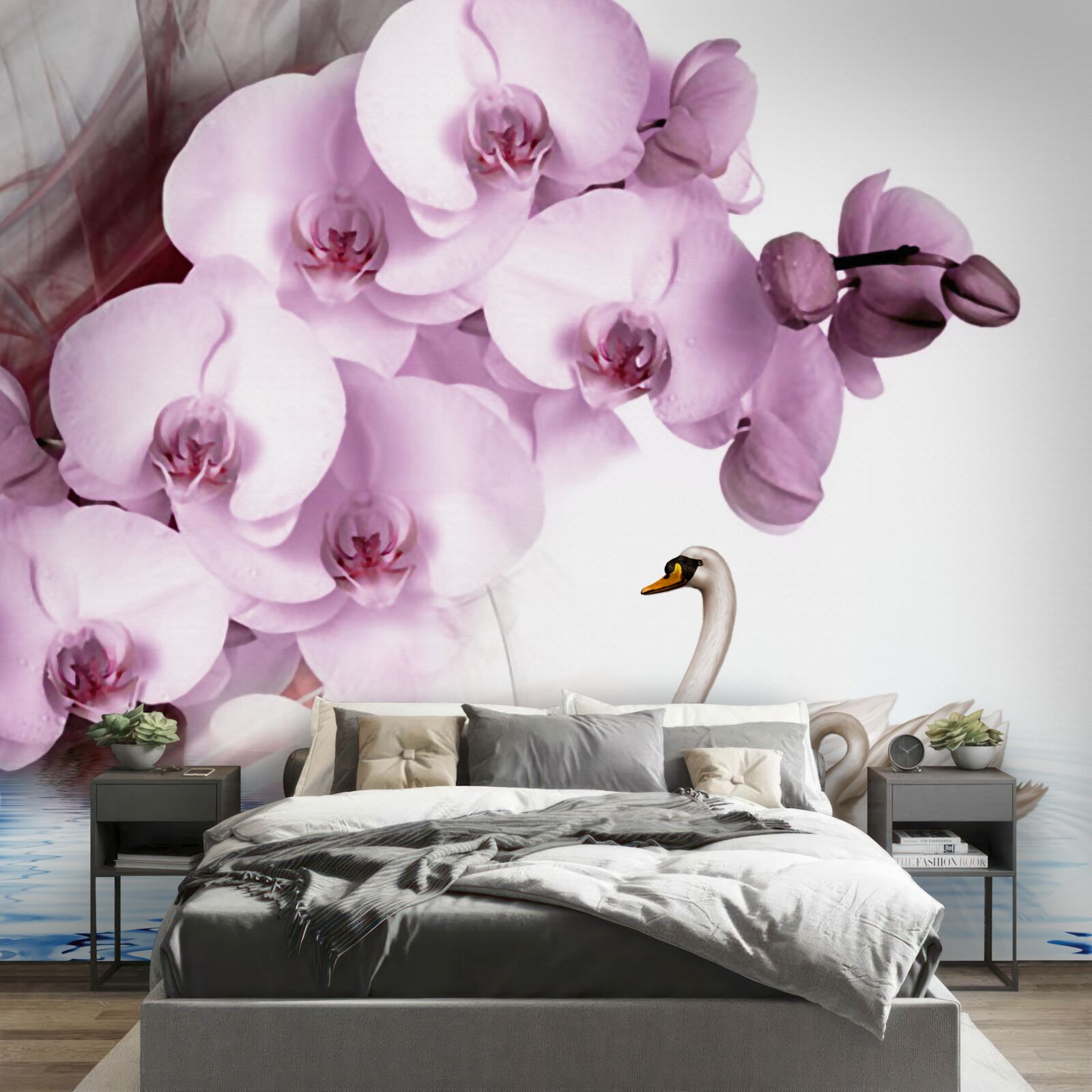 Fototapeta labute na vodnej hladine a jemný kvet orgovánovej orchidey