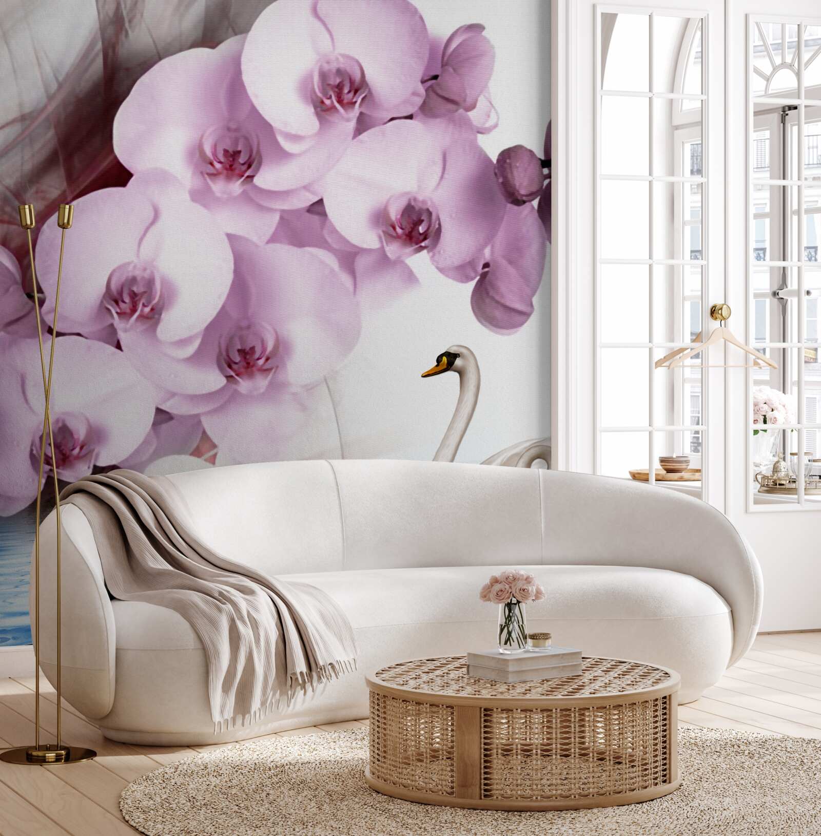 Fototapeta labute na vodnej hladine a jemný kvet orgovánovej orchidey