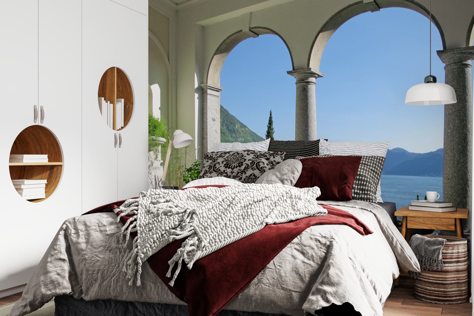 Fototapeta balkón s klenutými otvormi a výhľadom na vodu a hory