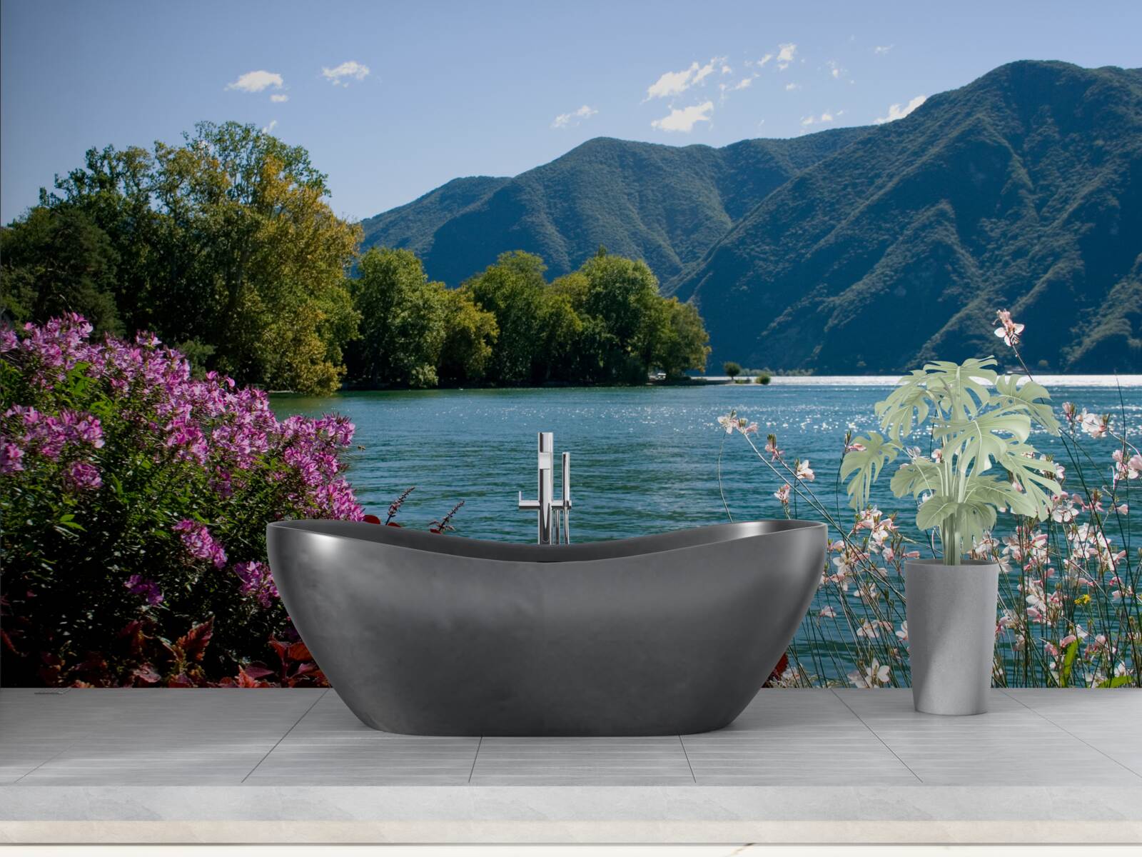 Fototapeta pokojné jazero v horách a kvitnúce letné rastliny