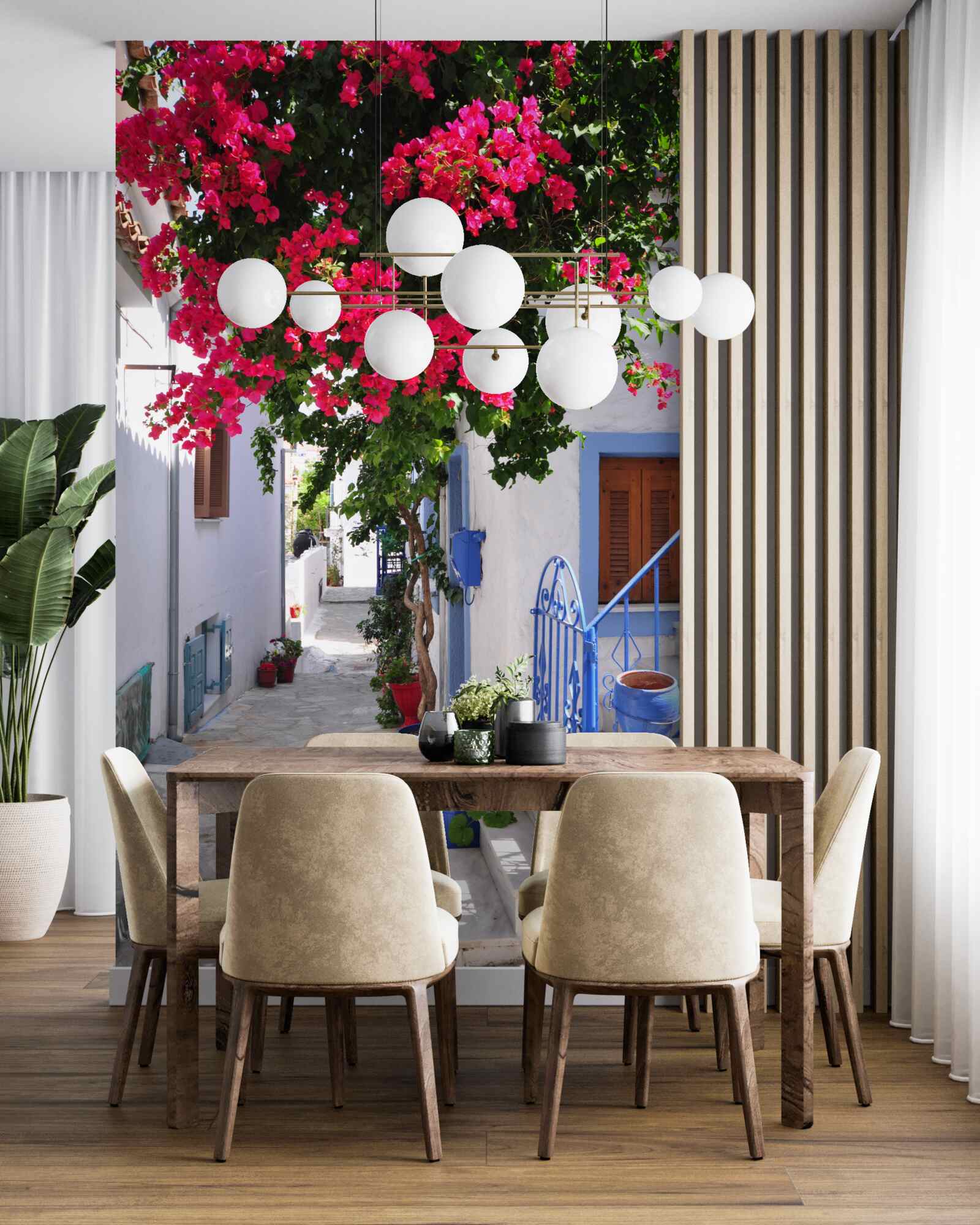 Fototapeta V Grécku pri bielych domoch rastú červené kvety