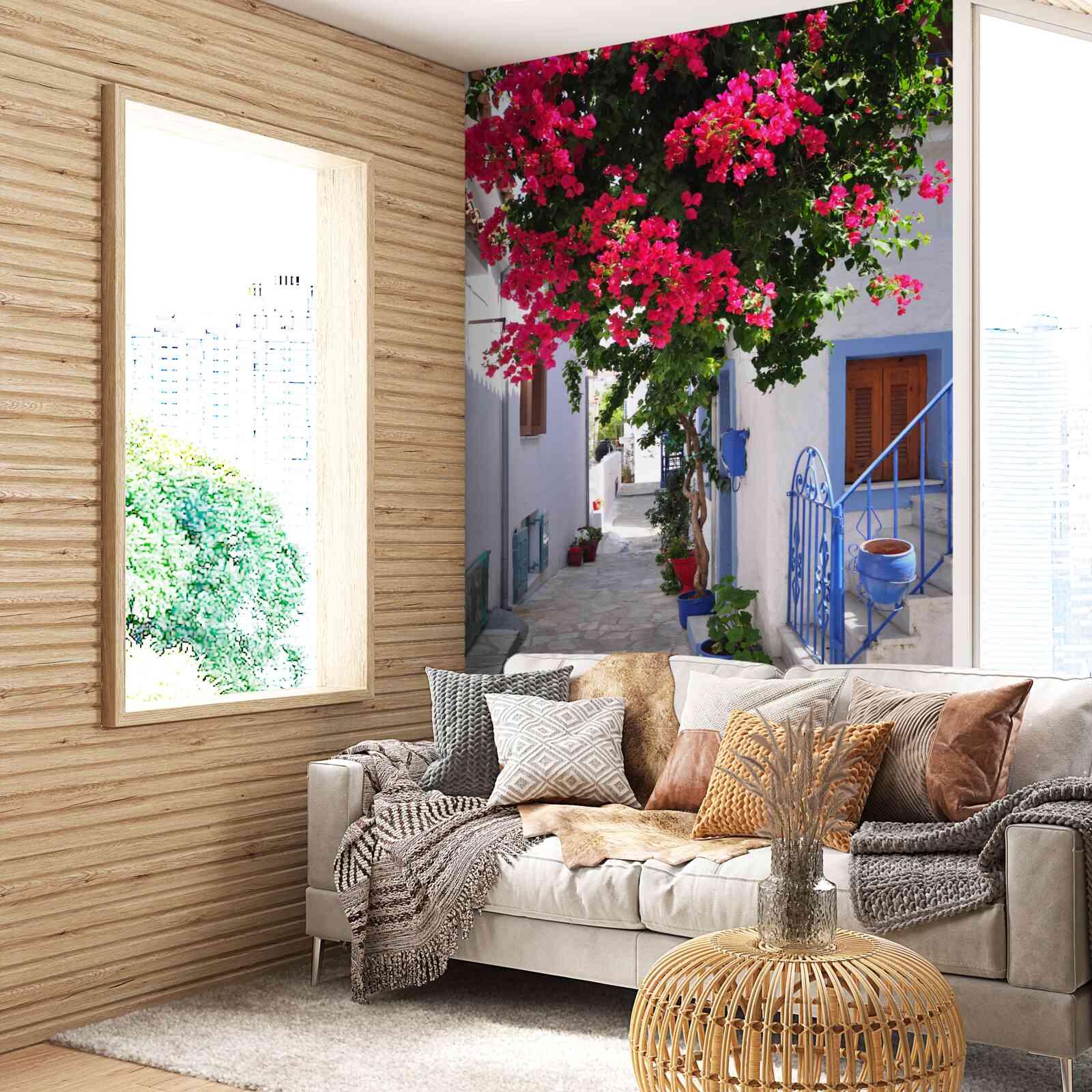 Fototapeta V Grécku pri bielych domoch rastú červené kvety