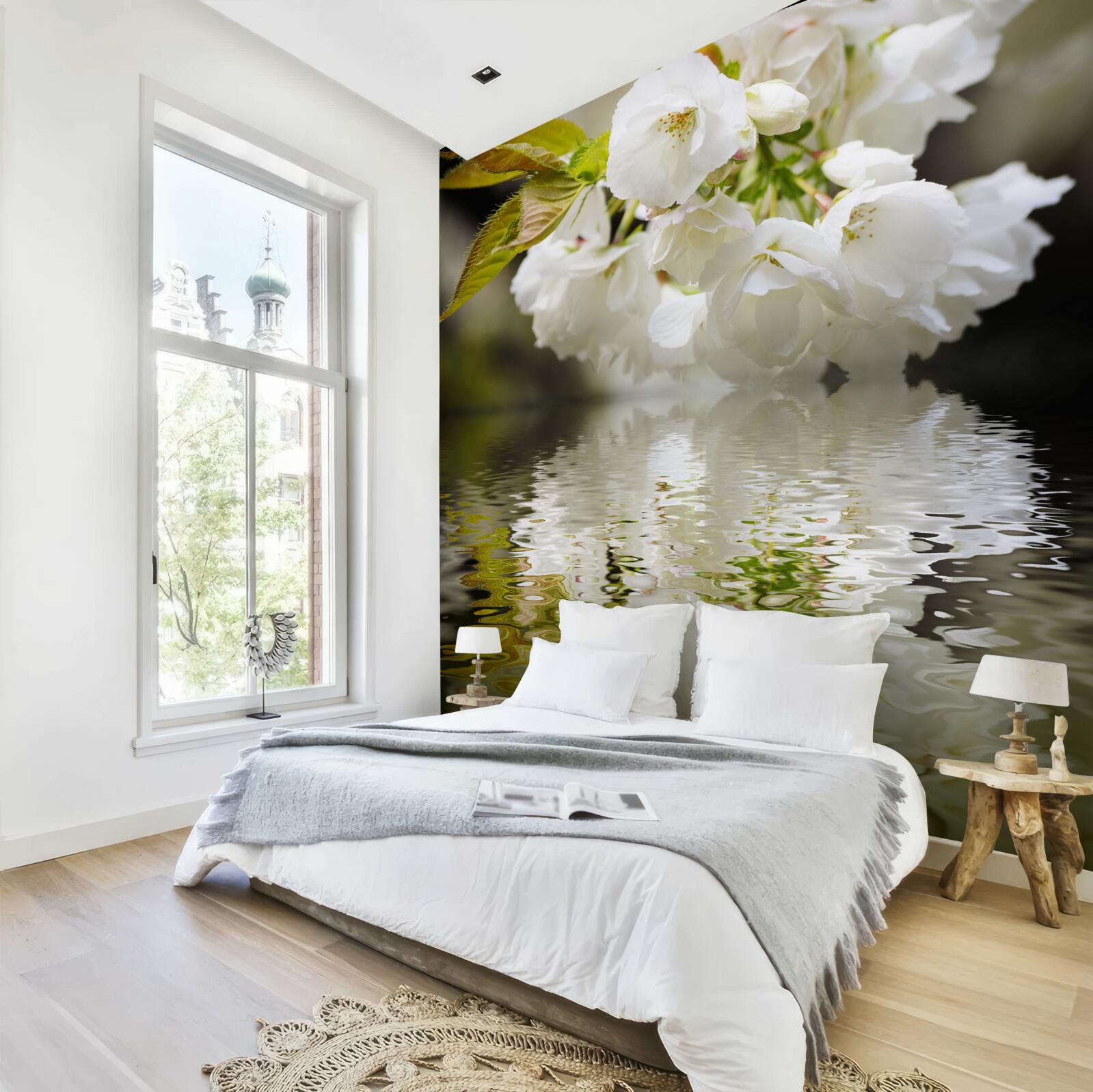 Fototapeta sakurové kvety v bielych odtieňoch sa skláňajú nad vodnou hladinou