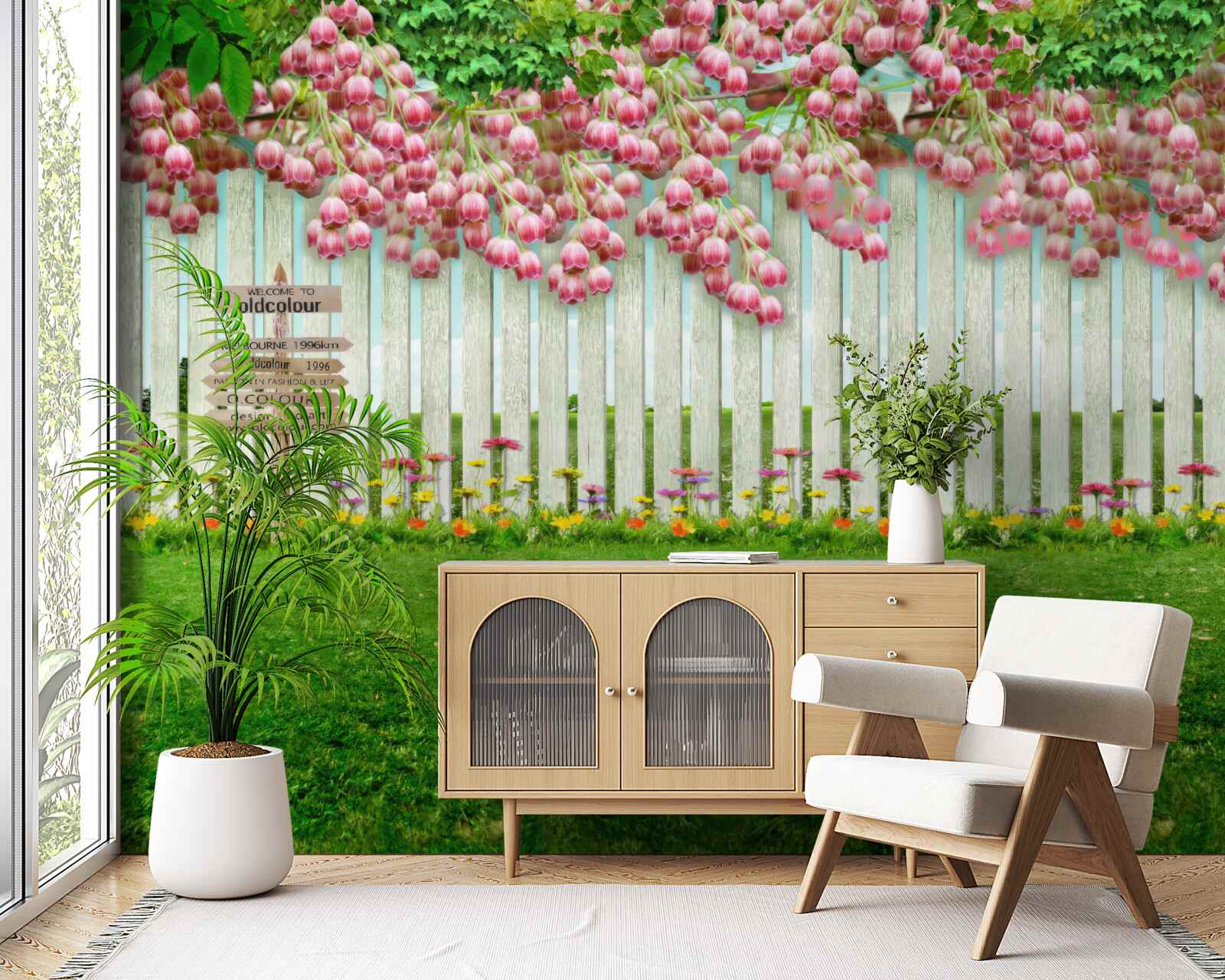 Fototapeta ružové kvety kaskáda cez biely plot