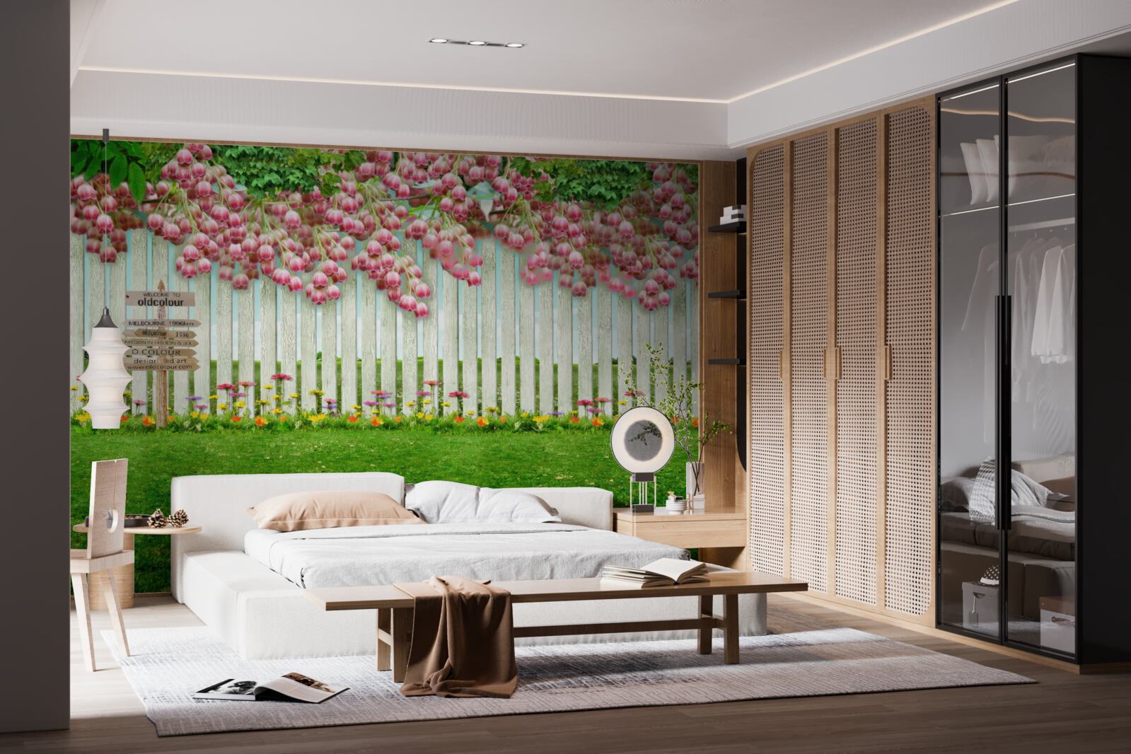 Fototapeta ružové kvety kaskáda cez biely plot