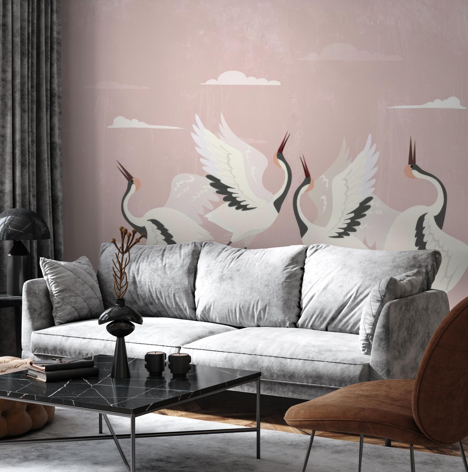 Fototapeta bociany naťahujú krky a pozerajú hore