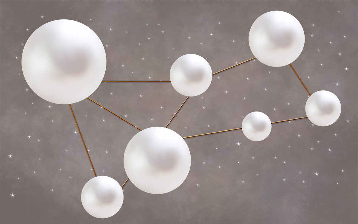 Fototapeta biele gule zdobené zlatými linkami sú roztrúsené na sivom podklade